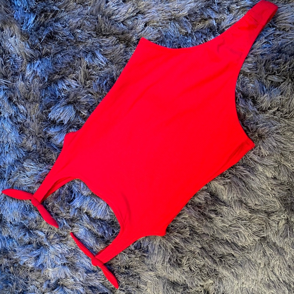 Red tie-strap body suit